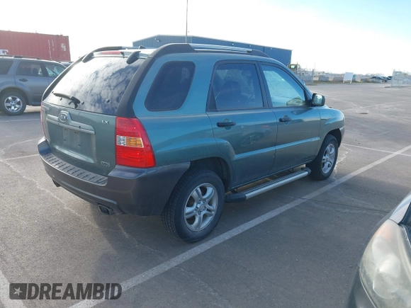 2008 Kia Sportage LX with VIN KNDJE723787521869, listed as a IAAI auction lot 41854551 with 167,997 mi miles. Bid and sale history available at carsss.com. Image 4.