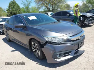 2017 Honda Civic EX-L z VIN 2HGFC1F73HH650204, wystawiony jako IAAI lot #42277420 z przebiegiem 84 081 mil mil oraz . Historia ofert i sprzedaży dostępna na DreamBid. Obrazek 1.