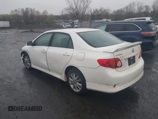 2010 Toyota Corolla with VIN 2T1BU4EEXAC413978, listed as a IAAI auction lot 41953898 with 121,676 mi miles. Bid and sale history available at carsss.com. Image 3.