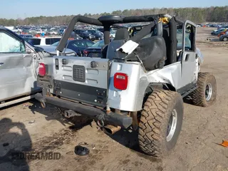 2006 Jeep Wrangler Unlimited LWB with VIN 1J4FA44S76P755148, listed as a IAAI auction lot 41774840 with 167,914 mi miles. Bid and sale history available at carsss.com. Image 4.
