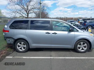 2013 Toyota Sienna L with VIN 5TDZK3DC9DS298333, listed as a IAAI auction lot 41941011 with 141,021 mi miles. Bid and sale history available at carsss.com. Image 13.