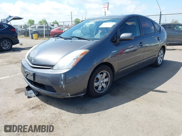 2008 Toyota Prius with VIN JTDKB20U883429446, listed as a IAAI auction lot 42073114 with 141,332 mi miles. Bid and sale history available at carsss.com. Image 2.