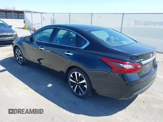 2018 Nissan Altima SV with VIN 1N4AL3AP5JC285843, listed as a IAAI auction lot 41956374 with 100,688 mi miles and . Bid and sale history available at carsss.com. Image 3.