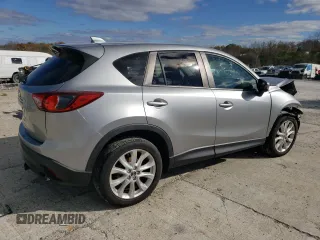 2013 Mazda CX-5 Grand Touring with VIN JM3KE4DE8D0102280, listed as a Copart auction lot 79750774 with 151,797 mi miles and Salvage Title. Bid and sale history available at DreamBid. Image 3.