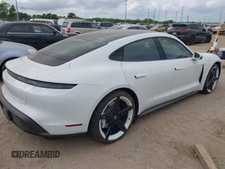 2022 Porsche Taycan z VIN WP0AA2Y10NSA12920, wystawiony jako IAAI lot #42047850 z przebiegiem 22 300 mil mil oraz . Historia ofert i sprzedaży dostępna na DreamBid. Obrazek 4.