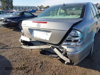 2005 Mercedes-Benz E-Class 3.2L with VIN WDBUF65J05A646577, listed as a IAAI auction lot 41666861 with 106,012 mi miles. Bid and sale history available at carsss.com. Image 6.