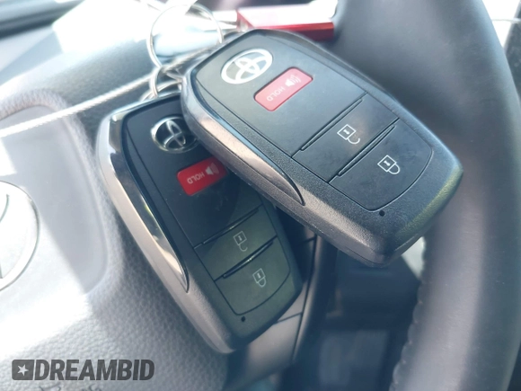 2024 Toyota Prius LE with VIN JTDACAAU5R3046244, listed as a IAAI auction lot 42464523 with 13,590 mi miles and . Bid and sale history available at DreamBid. Image 11.