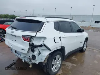 2022 Jeep Compass Latitude with VIN 3C4NJCBB8NT137619, listed as a IAAI auction lot 42211859 with 31,319 mi miles and . Bid and sale history available at DreamBid. Image 4.