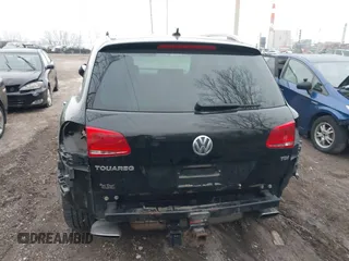 2012 Volkswagen Touareg Sport with VIN WVGFK9BP7CD002243, listed as a IAAI auction lot 41863765 with 136,231 mi miles and . Bid and sale history available at DreamBid. Image 6.
