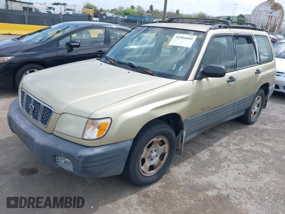 2001 Subaru Forester L with VIN JF1SF63511G703834, listed as a IAAI auction lot 41904604 with 137,225 mi miles. Bid and sale history available at carsss.com. Image 2.