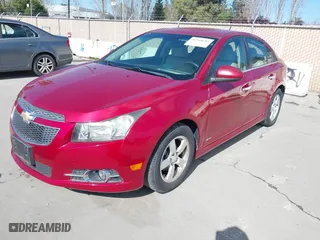 2011 Chevrolet Cruze LT w/2LT with VIN 1G1PG5S96B7182034, listed as a IAAI auction lot 41948689 with 108,321 mi miles. Bid and sale history available at carsss.com. Image 2.