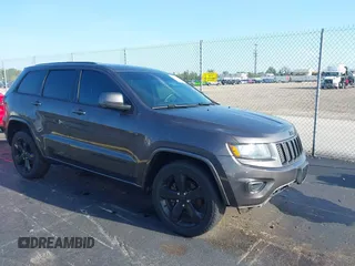 2015 Jeep Grand Cherokee Altitude z VIN 1C4RJFAG0FC785260, wystawiony jako IAAI lot #42656853 z przebiegiem 100 478 mil mil oraz . Historia ofert i sprzedaży dostępna na DreamBid. Obrazek 1.