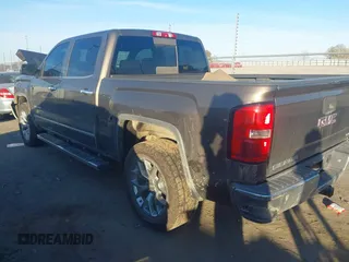 2014 GMC Sierra 1500 SLT with VIN 3GTU2VEC4EG216206, listed as a IAAI auction lot 41082064 with 249,332 mi miles and . Bid and sale history available at DreamBid. Image 3.