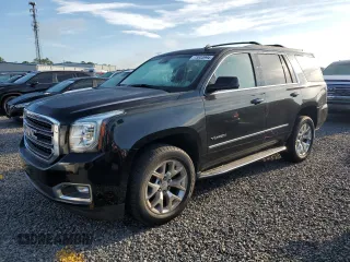 2015 GMC Yukon SLT with VIN 1GKS2BKC9FR118305, listed as a Copart auction lot 73833994 with 0 mi miles and Salvage Title. Bid and sale history available at carsss.com. Image 1.