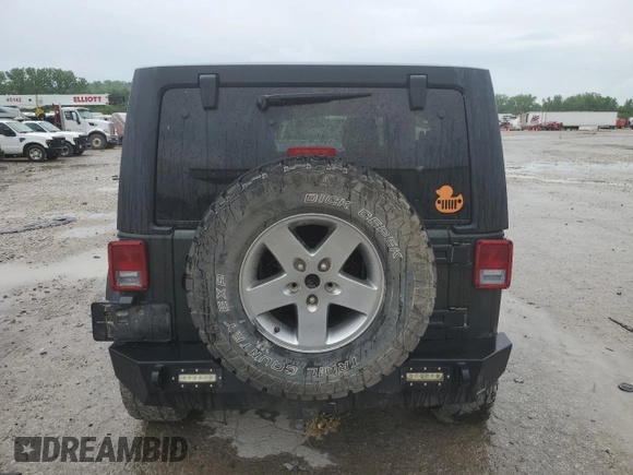 2011 Jeep Wrangler Unlimited Rubicon z VIN 1J4BA6H16BL615993, wystawiony jako Copart lot #55420275 z przebiegiem 200 403 mil mil oraz Szkoda całkowita • Salvage title. Historia ofert i sprzedaży dostępna na DreamBid. Obrazek 6.