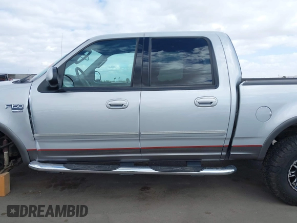 2003 Ford F-150 XLT with VIN 1FTRW08LX3KC79700, listed as a IAAI auction lot 41680562 with 131,052 mi miles. Bid and sale history available at carsss.com. Image 15.