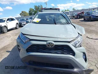 2020 Toyota RAV4 XLE with VIN 2T3W1RFV0LC081789, listed as a IAAI auction lot 42272557 with 91,399 mi miles and . Bid and sale history available at DreamBid. Image 12.