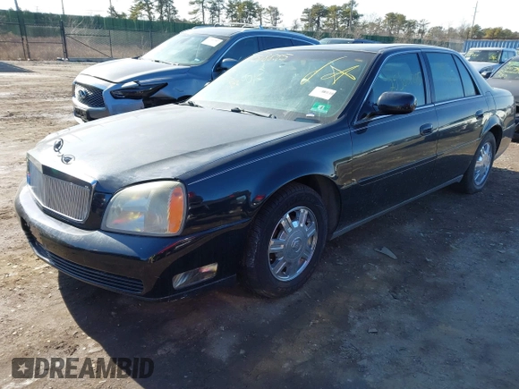 2004 Cadillac DeVille DHS z VIN 1G6KE57YX4U261849, wystawiony jako IAAI lot #41518835 z przebiegiem Nie podano mil oraz . Historia ofert i sprzedaży dostępna na DreamBid. Obrazek 2.