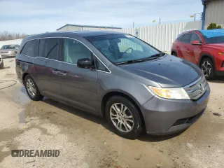 2012 Honda Odyssey EX-L with VIN 5FNRL5H61CB067331, listed as a Copart auction lot 50016455 with 156,020 mi miles and Non Repairable. Bid and sale history available at DreamBid. Image 4.