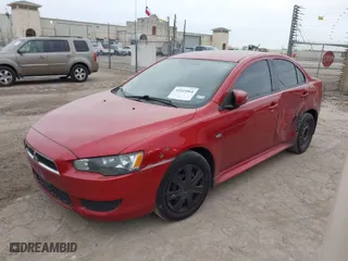 2015 Mitsubishi Lancer ES with VIN JA32U2FU6FU025259, listed as a IAAI auction lot 41345564 with 184,953 mi miles. Bid and sale history available at carsss.com. Image 2.