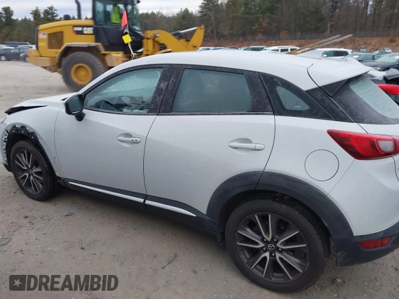 2016 Mazda CX-3 Grand Touring with VIN JM1DKFD7XG0132084, listed as a IAAI auction lot 41004954 with 70,476 mi miles. Bid and sale history available at carsss.com. Image 14.