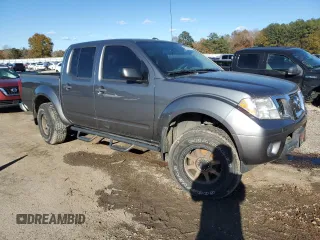 2017 Nissan Frontier Pro-4X with VIN 1N6DD0EV8HN766550, listed as a Copart auction lot 82722834 with 129,909 mi miles and Salvage title. Bid and sale history available at DreamBid. Image 4.