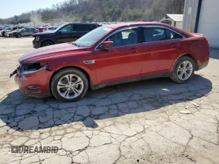 2014 Ford Taurus SEL z VIN 1FAHP2E85EG123211, wystawiony jako Copart lot #47933265 z przebiegiem 98 528 mil mil oraz Szkody całkowita. Historia ofert i sprzedaży dostępna na DreamBid. Obrazek 1.