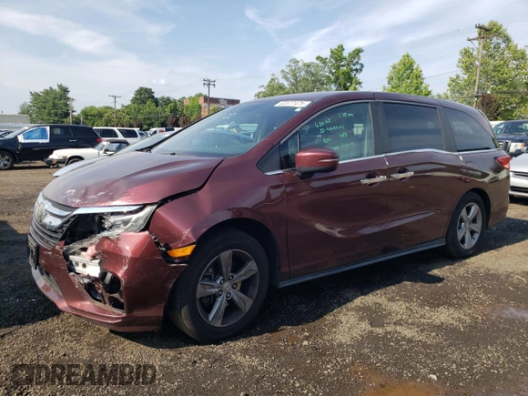 2018 Honda Odyssey EX with VIN 5FNRL6H55JB037386, listed as a Copart auction lot 63577475 with 125,498 mi miles and Salvage title. Bid and sale history available at DreamBid. Image 1.