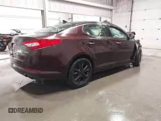 2011 Kia Optima EX with VIN KNAGN4A70B5108513, listed as a IAAI auction lot 42097595 with 184,334 mi miles and . Bid and sale history available at carsss.com. Image 4.