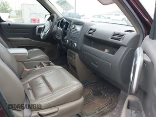 2007 Honda Ridgeline RTL z VIN 2HJYK16507H523994, wystawiony jako IAAI lot #42467682 z przebiegiem 283 292 mil mil oraz . Historia ofert i sprzedaży dostępna na DreamBid. Obrazek 5.