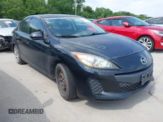 2012 Mazda Mazda3 i Sport with VIN JM1BL1UF7C1527424, listed as a IAAI auction lot 42055658 with 228,659 mi miles. Bid and sale history available at carsss.com. Image 1.
