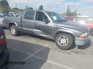 2003 Dodge Dakota SLT with VIN 1D7HL48N23S247441, listed as a IAAI auction lot 41359296 with 58,414 mi miles. Bid and sale history available at carsss.com. Image 13.