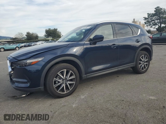 2018 Mazda CX-5 Grand Touring with VIN JM3KFADM7J0380568, listed as a Copart auction lot 48749015 with 53,401 mi miles and Salvage Title. Bid and sale history available at carsss.com. Image 1.