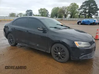 2011 Volkswagen Jetta SE with VIN 3VWDZ7AJXBM318518, listed as a Copart auction lot 50718595 with 164,353 mi miles and Salvage title. Bid and sale history available at DreamBid. Image 4.