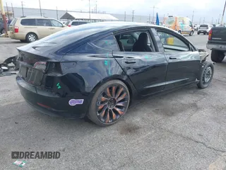 2019 Tesla Model 3 Mid Range with VIN 5YJ3E1EA3KF415601, listed as a IAAI auction lot 42125393 with 150,220 mi miles and . Bid and sale history available at carsss.com. Image 4.