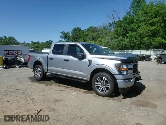 2023 Ford F-150 XL with VIN 1FTFW1E55PKF18784, listed as a Copart auction lot 52807315 with 15,284 mi miles and Salvage Title. Bid and sale history available at carsss.com. Image 13.