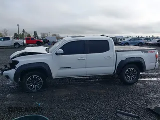 2021 Toyota Tacoma SR z VIN 3TMCZ5AN2MM426723, wystawiony jako IAAI lot #41604033 z przebiegiem 46 522 mil mil oraz . Historia ofert i sprzedaży dostępna na DreamBid. Obrazek 15.
