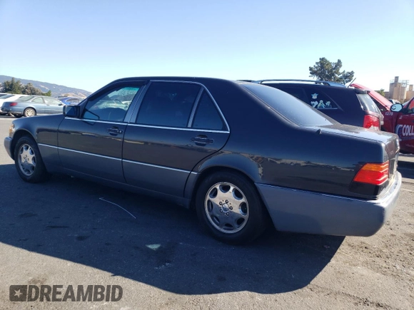 1994 Mercedes-Benz S with VIN WDBGA43E7RA171148, listed as a Copart auction lot 75522703 with 91,894 mi miles and Clean Title. Bid and sale history available at DreamBid. Image 2.