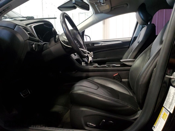 2016 Ford Fusion Titanium with VIN 3FA6P0K97GR405256, listed as a Copart auction lot 55289995 with 124,159 mi miles and Salvage Title. Bid and sale history available at DreamBid. Image 7.