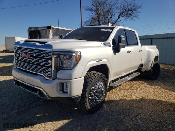 2021 GMC Sierra 3500HD Denali with VIN 1GT49WEY3MF162264, listed as a Copart auction lot 87002814 with 50,454 mi miles and Salvage Title. Bid and sale history available at carsss.com. Image 1.