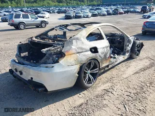 2016 BMW M6 with VIN WBS6J9C52GD934529, listed as a IAAI auction lot 40177964 with 51,664 mi miles. Bid and sale history available at carsss.com. Image 4.