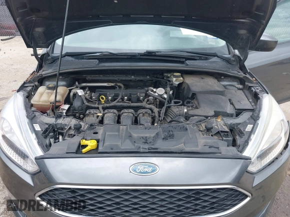 2018 Ford Focus SE z VIN 1FADP3F23JL321768, wystawiony jako IAAI lot #42415788 z przebiegiem 124 126 mil mil oraz . Historia ofert i sprzedaży dostępna na DreamBid. Obrazek 10.