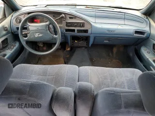1994 Ford Taurus GL z VIN 1FALP52U5RA152732, wystawiony jako Copart lot #70472324 z przebiegiem 52 781 mil mil oraz Szkoda całkowita • Salvage title. Historia ofert i sprzedaży dostępna na DreamBid. Obrazek 8.
