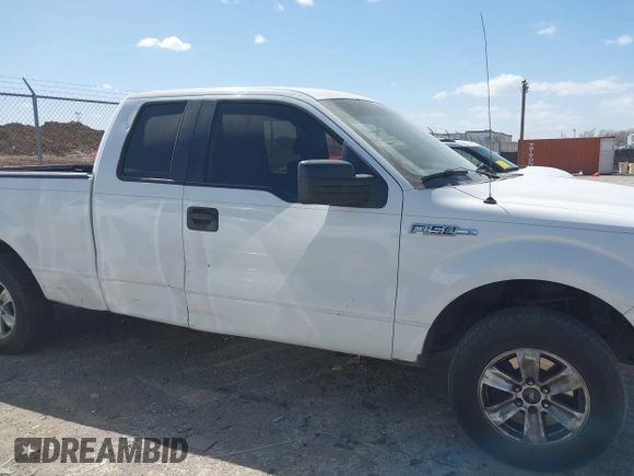 2011 Ford F-150 XL with VIN 1FTEX1CM8BFA77303, listed as a IAAI auction lot 41821852 with 320,133 mi miles. Bid and sale history available at carsss.com. Image 13.