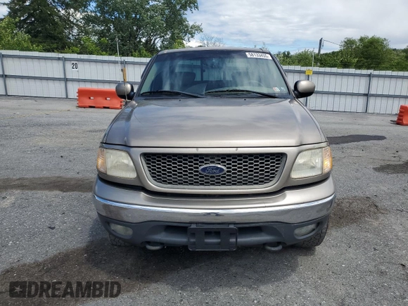 2001 Ford F-150 XLT z VIN 1FTRW08L71KB33686, wystawiony jako Copart lot #58133455 z przebiegiem 248 370 mil mil oraz Szkoda całkowita • Salvage title. Historia ofert i sprzedaży dostępna na DreamBid. Obrazek 5.