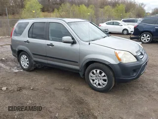 2005 Honda CR-V EX with VIN JHLRD78855C060637, listed as a IAAI auction lot 42079014 with 170,060 mi miles. Bid and sale history available at carsss.com. Image 1.
