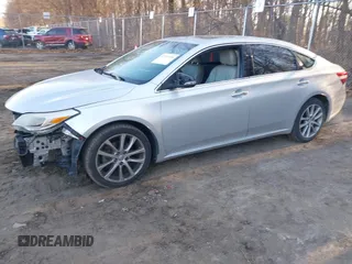 2014 Toyota Avalon Limited with VIN 4T1BK1EB4EU090185, listed as a IAAI auction lot 41715194 with 120,489 mi miles and . Bid and sale history available at carsss.com. Image 2.