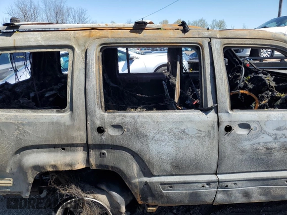 2010 Jeep Liberty Sport with VIN 1J4PN2GK1AW110261, listed as a Copart auction lot 54879855 with Not Provided miles and Salvage Title. Bid and sale history available at DreamBid. Image 11.