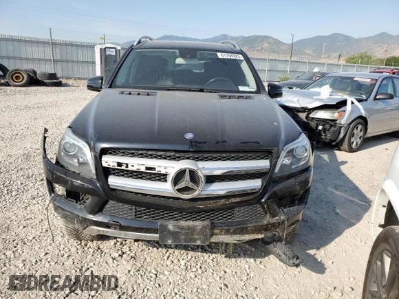 2014 Mercedes-Benz GL 450 z VIN 4JGDF7CE4EA419210, wystawiony jako Copart lot #61794925 z przebiegiem 92 509 mil mil oraz Szkoda całkowita • Salvage title. Historia ofert i sprzedaży dostępna na DreamBid. Obrazek 5.