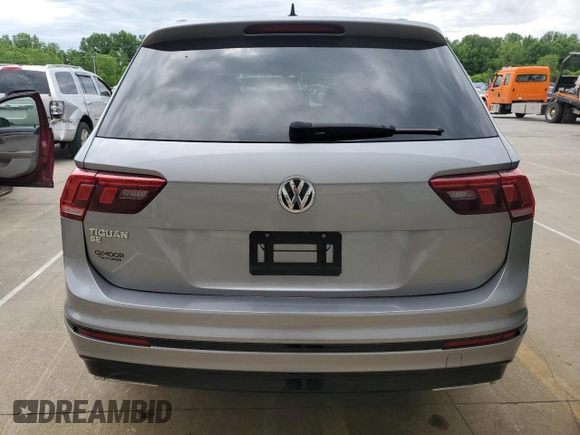 2021 Volkswagen Tiguan SE z VIN 3VV3B7AX8MM117650, wystawiony jako Copart lot #57075485 z przebiegiem 51 309 mil mil oraz Szkoda całkowita • Salvage title. Historia ofert i sprzedaży dostępna na DreamBid. Obrazek 6.